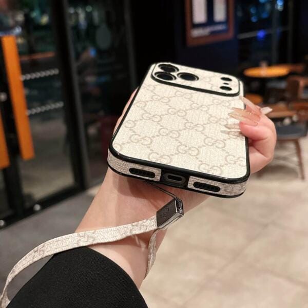 Gucci Leather Wristlet Case for iPhone 17 Series | Minimalist Design with 360° Camera Guard Gucci Leather Wristlet Case for iPhone 17 Series | Minimalist Design with 360° Camera Guard
