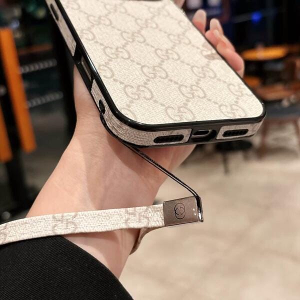 Gucci Leather Wristlet Case for iPhone 17 Series | Minimalist Design with 360° Camera Guard Gucci Leather Wristlet Case for iPhone 17 Series | Minimalist Design with 360° Camera Guard