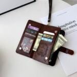 Louis Vuitton Monogram Folio Clutch for iPhone 17 Series | Zipper Wallet Case with Card & Cash Slots Louis Vuitton Monogram Folio Clutch for iPhone 17 Series | Zipper Wallet Case with Card & Cash Slots
